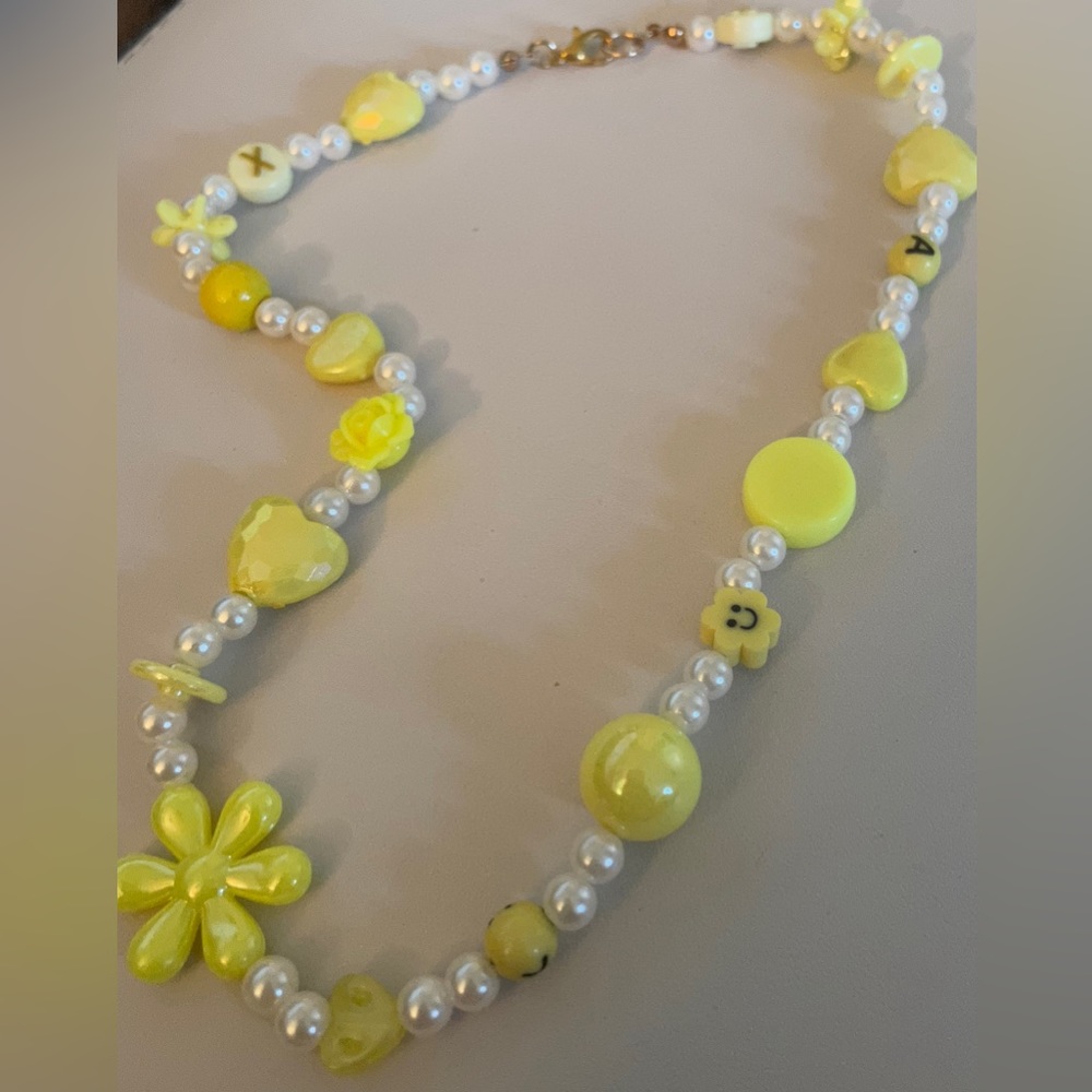 Yellow pearl charm necklace